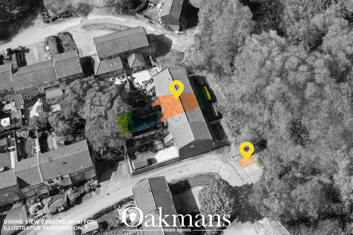 Drone photograph of residential property with corrugated roofing, orange pool cover, and surrounding woodland from above